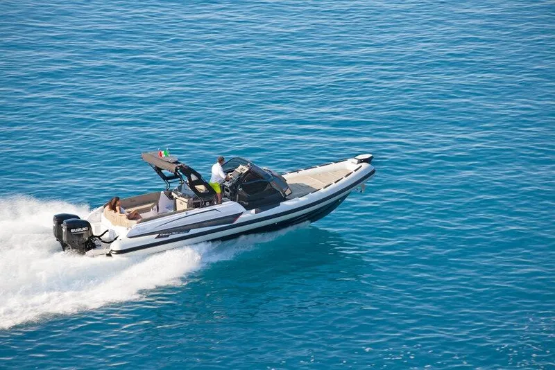 Slide: The Image of 2026 Ranieri CAYMAN 35.0 EXECUTIVE cruising on clear blue water. - 3
