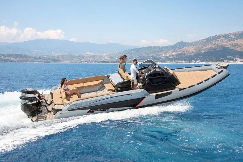 Slide: The Image of 2026 Ranieri CAYMAN 38.0 EXECUTIVE cruising on blue ocean with passengers onboard. - 2