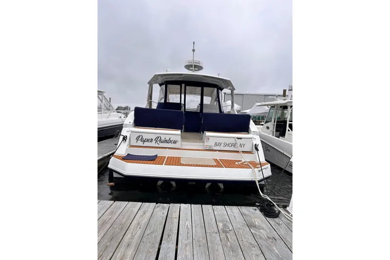 Slide: The Image of 2015 Cruisers Yachts 390 Express Coupe docked at Bay Shore, NY marina. - 3