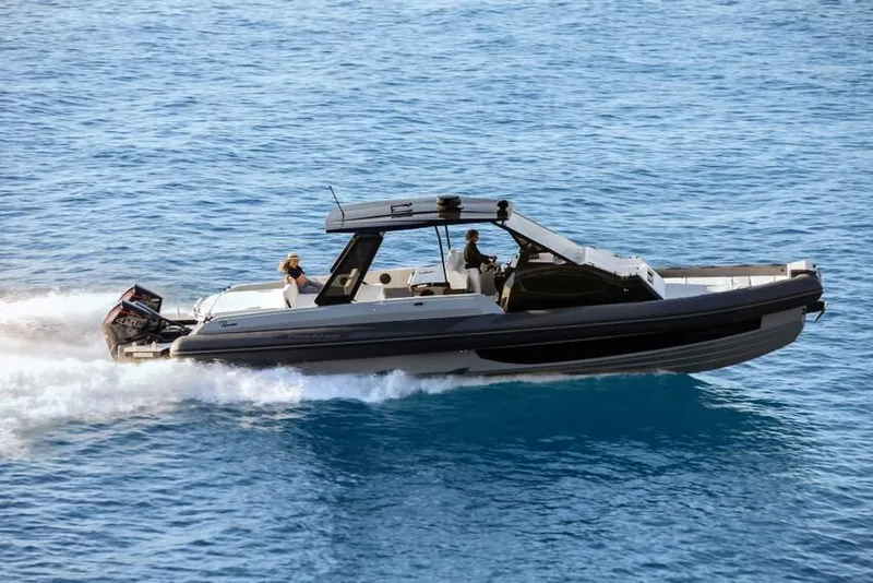 Slide: The Image of 2026 Ranieri Cayman 45.0 Executive cruising on blue ocean waters. - 1