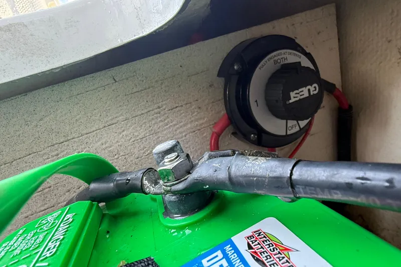 Slide: The Image of Battery setup in 2023 Hurricane SunDeck Sport 205 OB boat with Guest switch. - 18