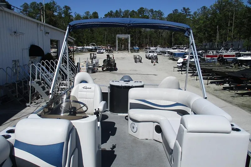 Slide: The Image of 2018 Apex Marine 820 Lanai Sport Cruise Adventure pontoon boat at a marina. - 10