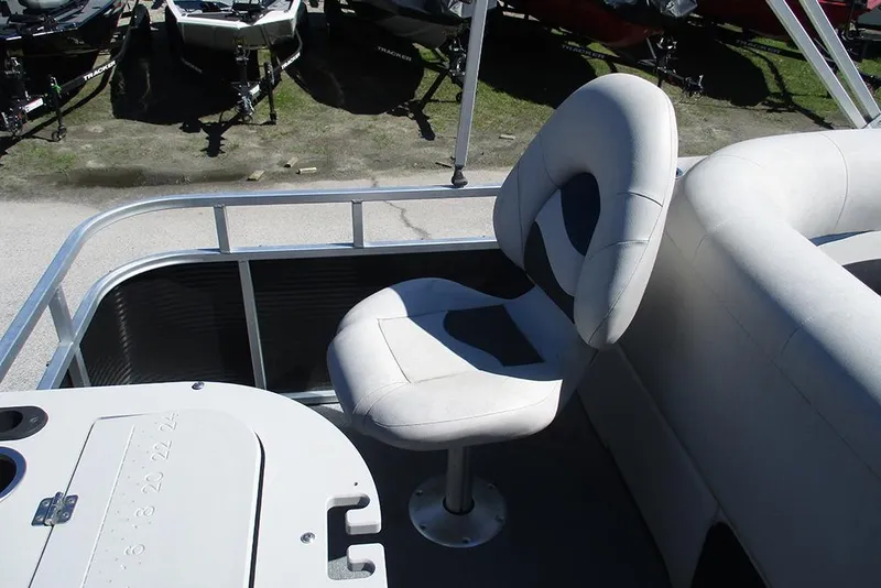 Slide: The Image of 2018 Apex Marine 820 Lanai Sport Cruise Adventure boat seating area. - 22