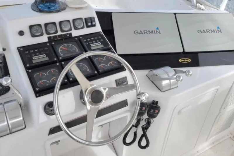 Slide: The Image of Cockpit of 1998 Ocean 53 Convertible yacht with Garmin navigation displays. - 11