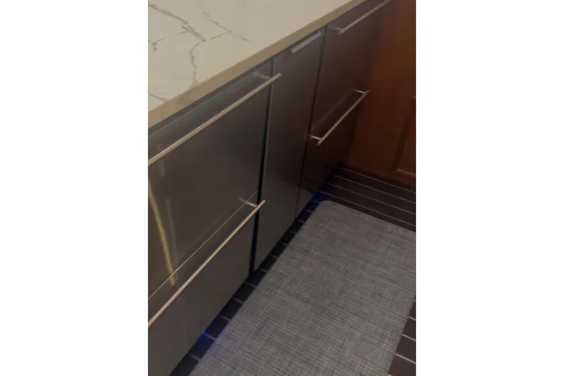 Slide: The Image of Modern kitchen interior on a 1998 Ocean 53 Convertible yacht. - 23