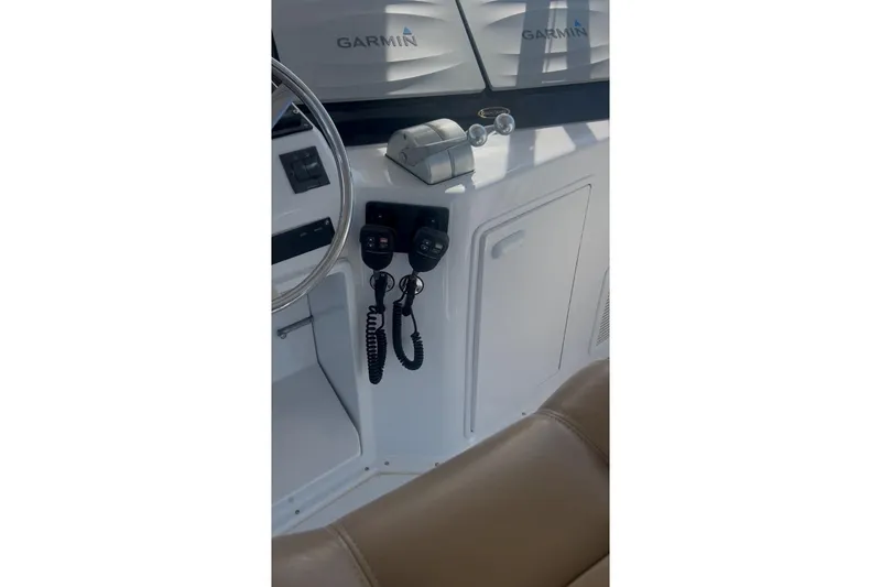 Slide: The Image of Interior of 1998 Ocean 53 Convertible boat with Garmin navigation equipment. - 38
