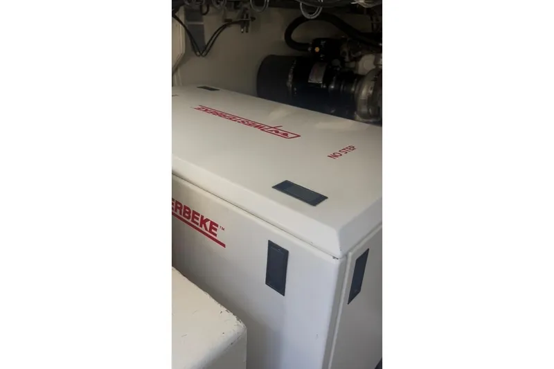 Slide: The Image of Engine room of 1998 Ocean 53 Convertible yacht with Westerbeke generator. - 40