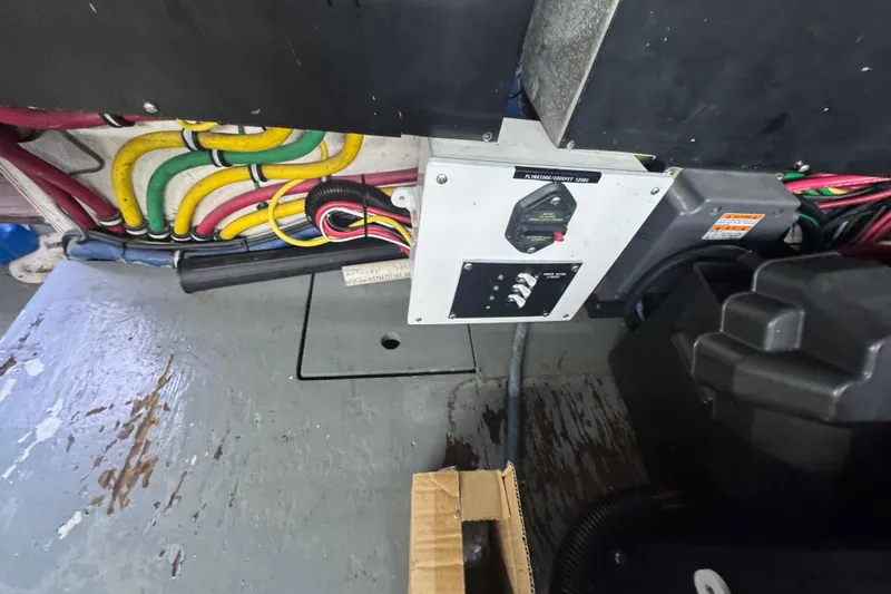 Slide: The Image of Engine room wiring and control panel of a 1990 Hatteras 52 Convertible yacht. - 29