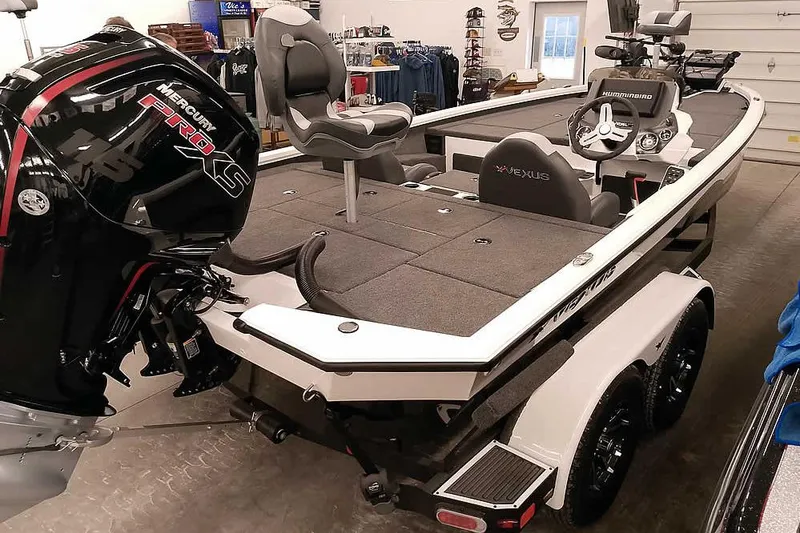 The Image of 2022 Vexus AVX1980 boat with Mercury Pro XS engine in showroom. - 1