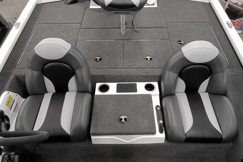 Slide: The Image of 2022 Vexus AVX1980 boat interior with dual seats and center console. - 17