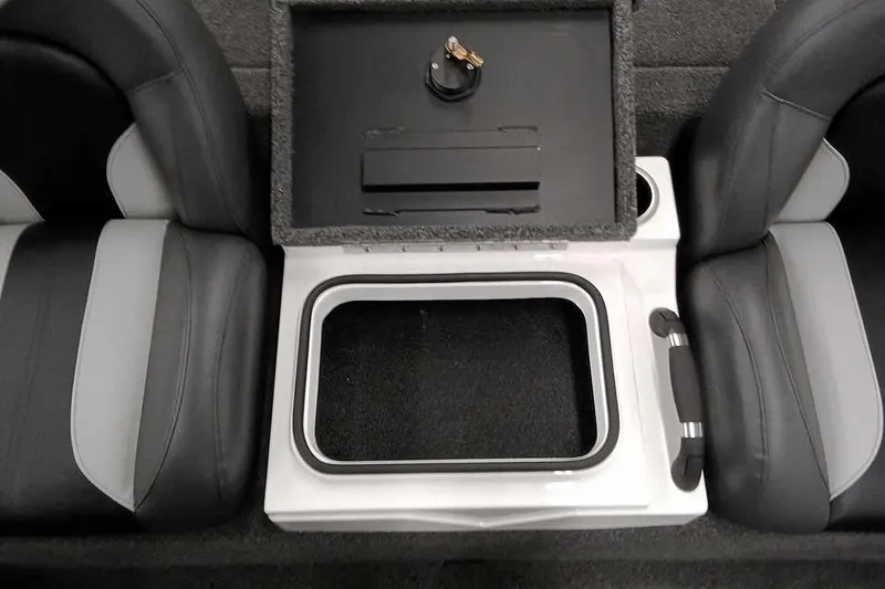 Slide: The Image of 2022 Vexus AVX1980 boat interior with open storage compartment between seats. - 18