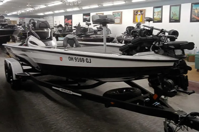 Slide: The Image of 2022 Vexus AVX1980 boat in showroom, featuring sleek design and modern equipment. - 27