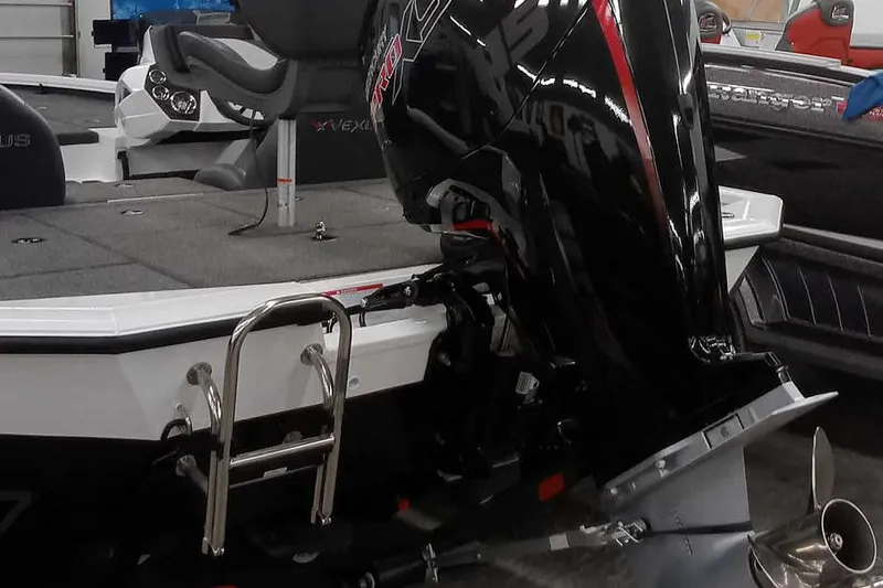 Slide: The Image of 2022 Vexus AVX1980 boat with powerful outboard motor and ladder. - 4