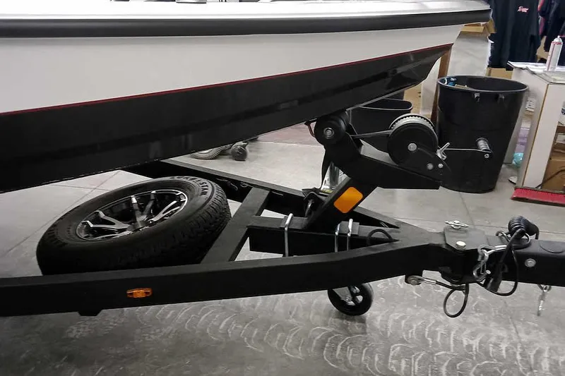 Slide: The Image of 2022 Vexus AVX1980 boat trailer with black frame and spare tire. - 5