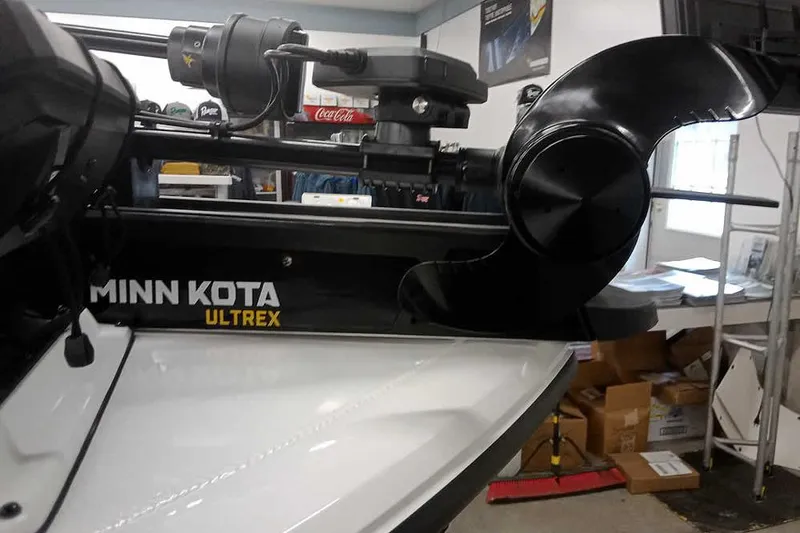 Slide: The Image of 2022 Vexus AVX1980 with Minn Kota Ultrex trolling motor in a showroom. - 6