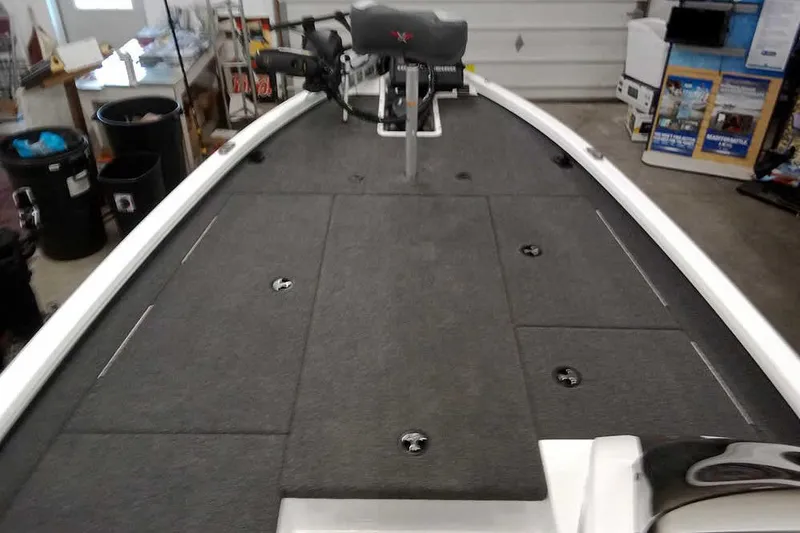 Slide: The Image of 2022 Vexus AVX1980 boat interior with gray deck and mounted equipment. - 8