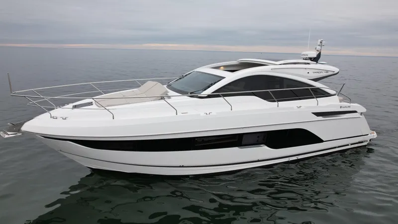 Slide: The Image of 2024 Fairline Targa 45 GT luxury yacht on calm waters. - 1