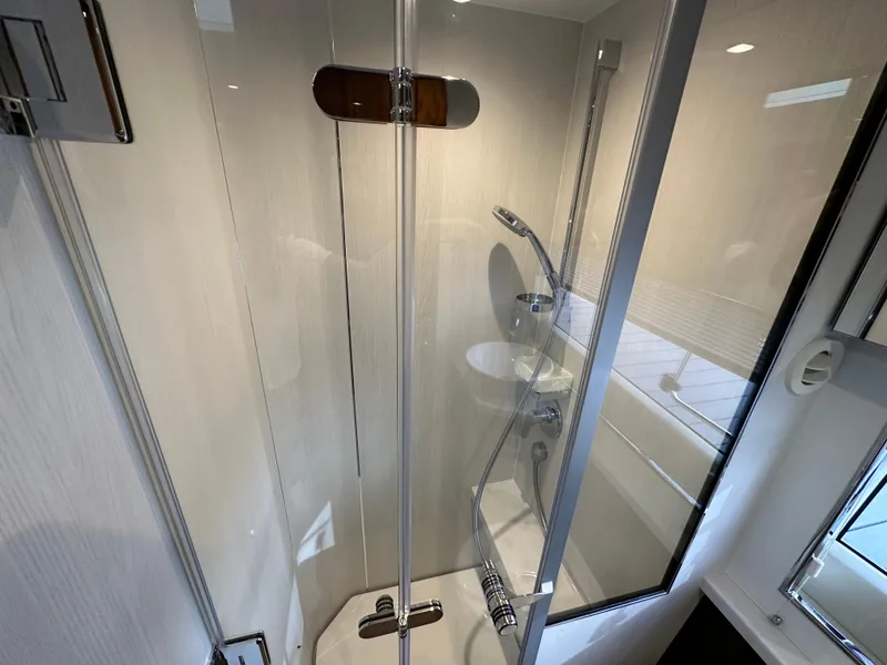 Slide: The Image of 2024 Fairline Targa 45 GT yacht bathroom with modern shower enclosure. - 16