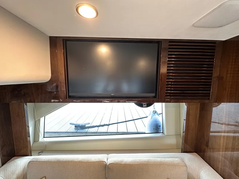 Slide: The Image of Fairline Targa 45 GT 2024 interior with TV and window view. - 22