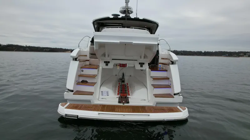 Slide: The Image of 2024 Fairline Targa 45 GT yacht rear view on water. - 3