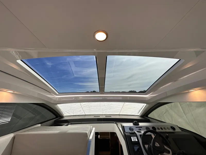 Slide: The Image of Interior view of 2024 Fairline Targa 45 GT with panoramic sunroof. - 32