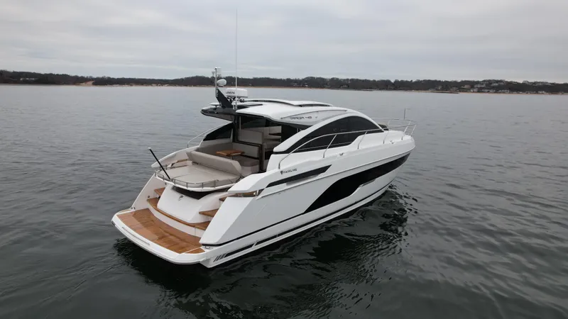 Slide: The Image of 2024 Fairline Targa 45 GT luxury yacht on calm waters. - 4