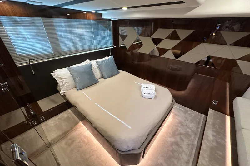 Slide: The Image of Luxurious interior of 2024 Fairline Targa 45 GT yacht with modern kitchen and seating area. - 42