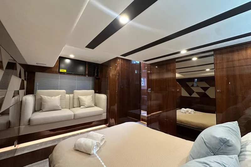 Slide: The Image of Luxurious interior of 2024 Fairline Targa 45 GT yacht featuring bedroom and bathroom. - 44