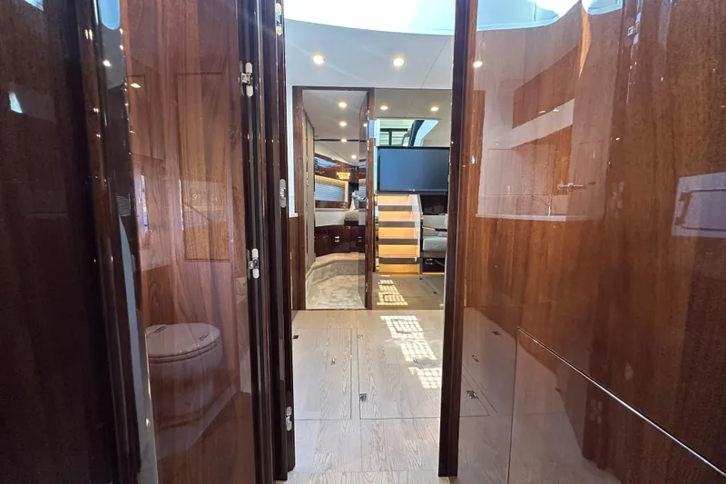 Slide: The Image of Luxurious interior of 2024 Fairline Targa 45 GT yacht with polished wood finishes. - 50