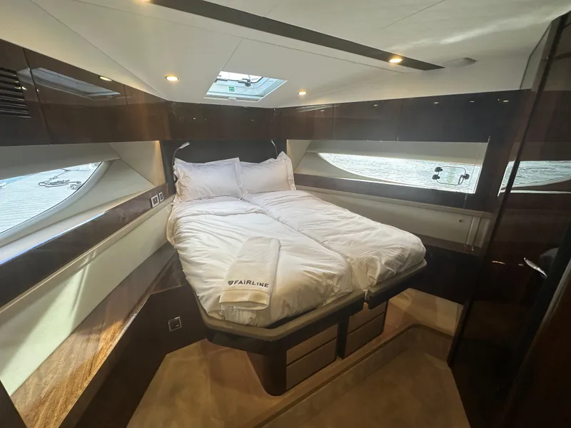 Slide: The Image of Luxurious bedroom in 2024 Fairline Targa 45 GT yacht with skylight and modern design. - 6