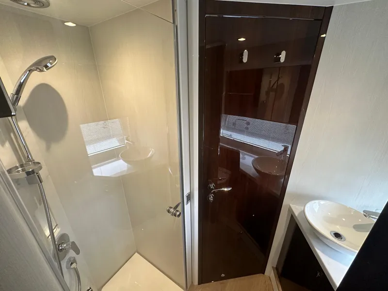 Slide: The Image of Modern bathroom in 2024 Fairline Targa 45 GT yacht with shower and sink. - 9