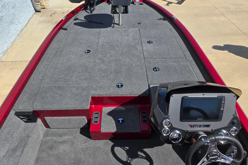 Slide: The Image of 2026 Vexus AVX 2080 boat interior with steering console and carpeted deck. - 5