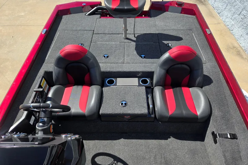 Slide: The Image of 2026 Vexus AVX 2080 boat interior with red and black seats, steering wheel, and storage compartments. - 8