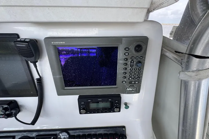 Slide: The Image of Furuno navigation system on 2006 Twin Vee 36 Center Console boat dashboard. - 15