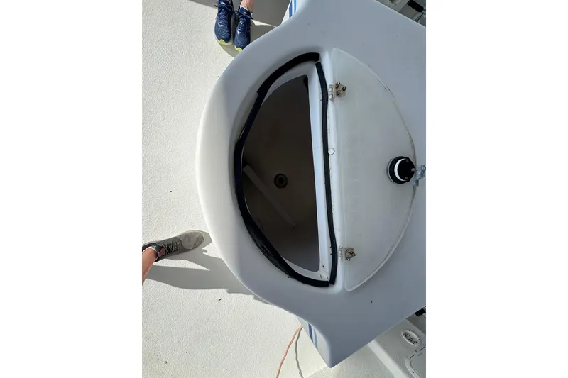 Slide: The Image of Open hatch on 2006 Twin Vee 36 Center Console boat deck. - 20