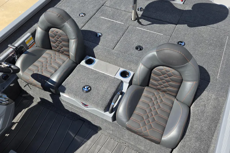 Slide: The Image of 2026 Vexus AVX1980 boat interior with two cushioned seats and carpeted flooring. - 10