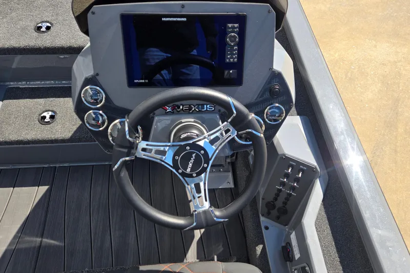 Slide: The Image of 2026 Vexus AVX1980 boat dashboard with steering wheel and control panel. - 5