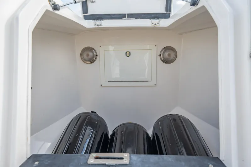 Slide: The Image of Interior storage compartment of 2015 Intrepid 375 Center Console boat. - 20