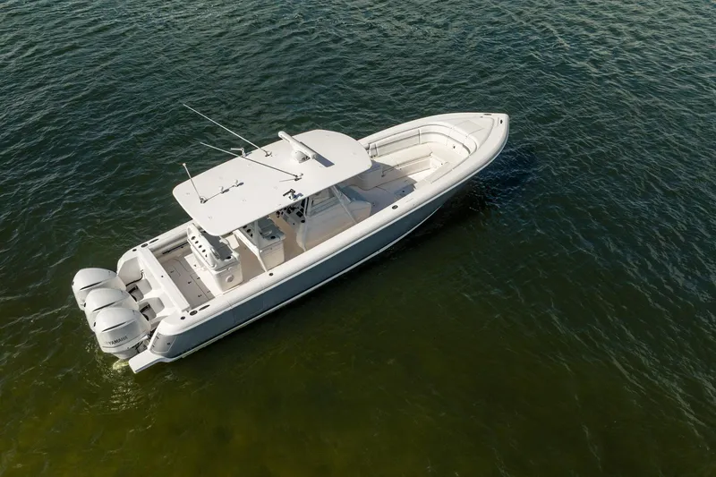 Slide: The Image of 2015 Intrepid 375 Center Console boat on calm water, aerial view. - 6
