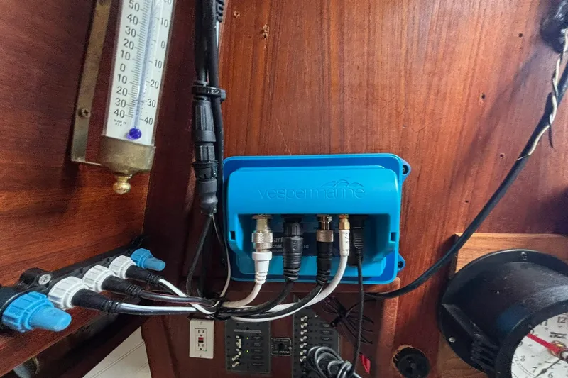 Slide: The Image of Electrical setup on a 1977 Pacific Seacraft 31 sailboat with Vesper Marine equipment. - 15