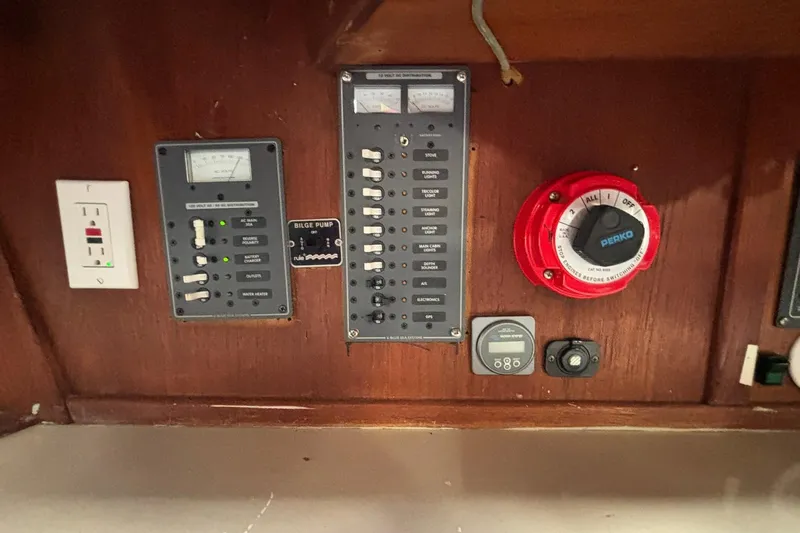 Slide: The Image of Electrical control panel on a 1977 Pacific Seacraft 31 sailboat. - 16