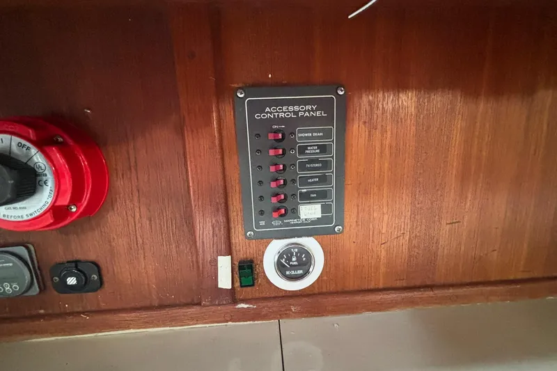 Slide: The Image of Accessory control panel on a 1977 Pacific Seacraft 31 boat interior. - 17