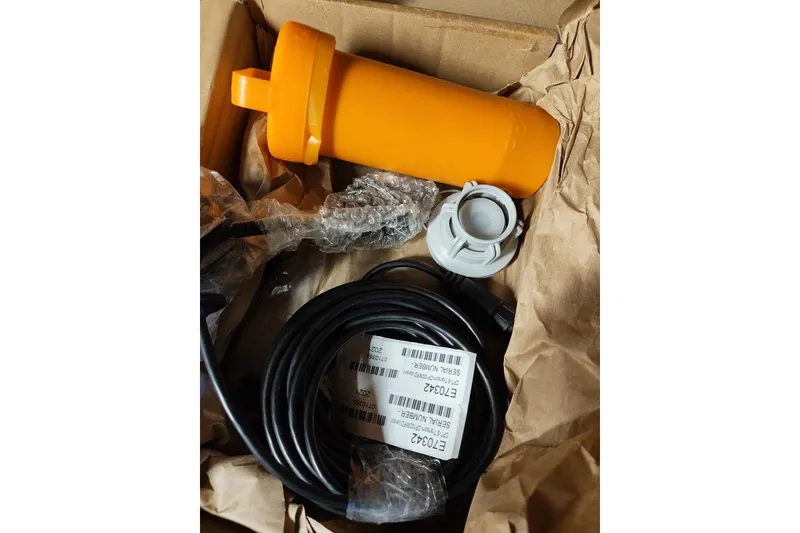 Slide: The Image of Orange marine equipment with cables for Pacific Seacraft 31, 1977 model. - 19