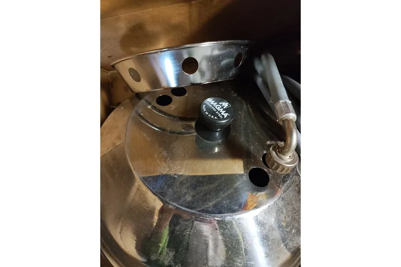 Slide: The Image of Stainless steel Magma grill on a 1977 Pacific Seacraft 31 sailboat. - 21