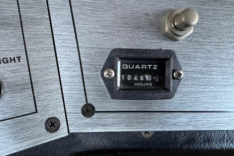 Slide: The Image of Hour meter on 1993 Gibson 44 Cabin Yacht dashboard, displaying 10467 hours. - 69
