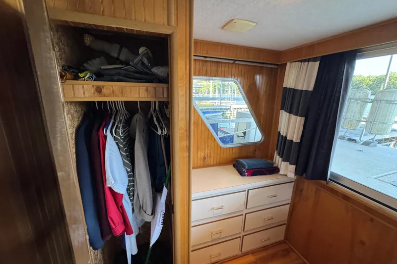 Slide: The Image of Interior of 1993 Gibson 44 Cabin Yacht with closet and drawers. - 31