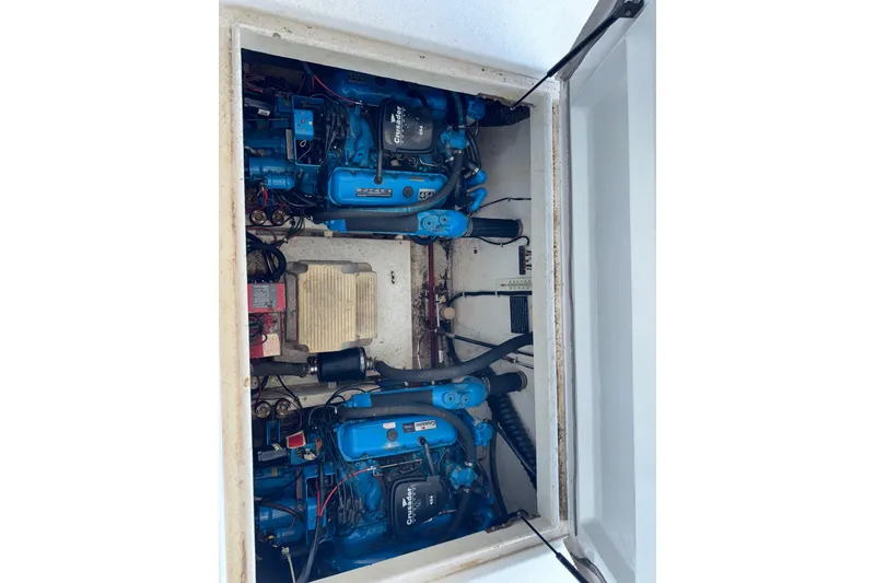 Slide: The Image of Engine compartment of 1993 Gibson 44 Cabin Yacht with twin Crusader engines. - 43