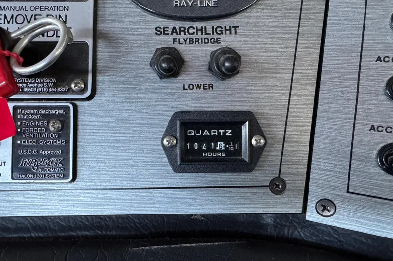 Slide: The Image of Control panel of a 1993 Gibson 44 Cabin Yacht with quartz hour meter. - 68