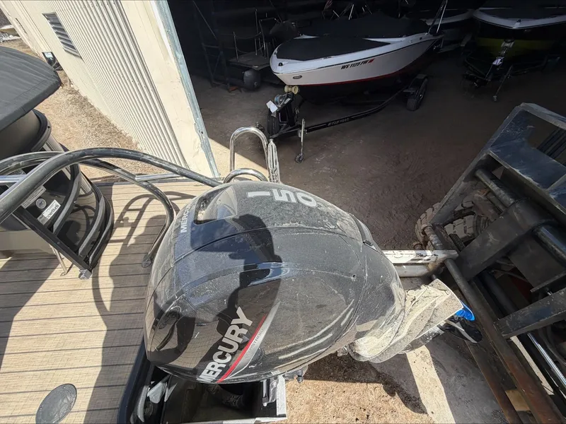 Slide: The Image of Starcraft SLS 3 boat with Mercury outboard motor, 2023 model. - 14