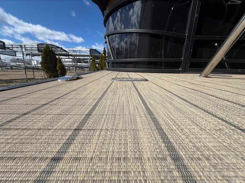 Slide: The Image of Starcraft SLS 3 2023 boat deck with blue sky. - 17